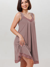 Nightgown features lace detailing along the neckline and hem