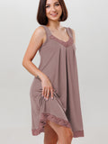 Nightgown features lace detailing along the neckline and hem