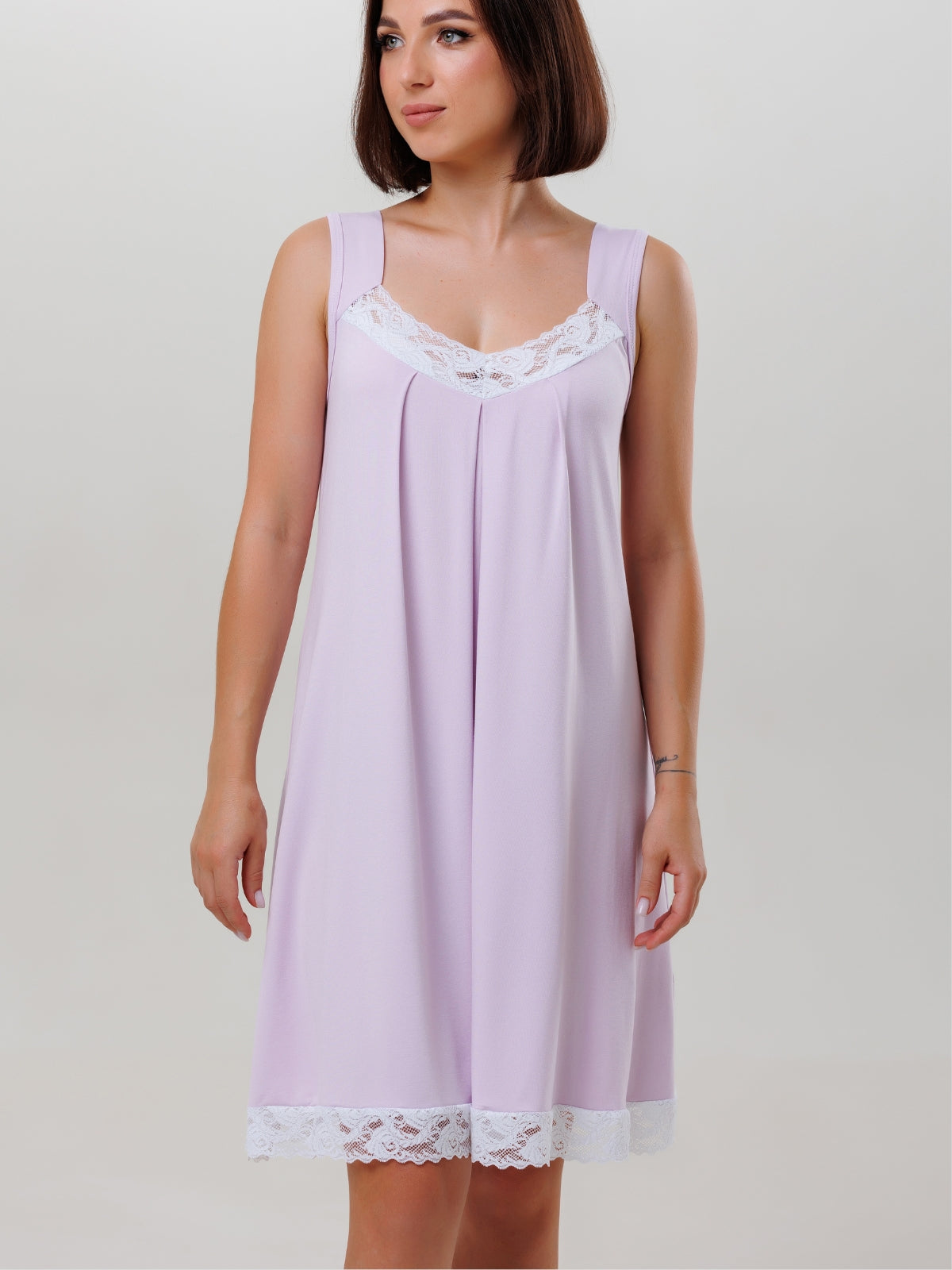 Nightgown features lace detailing along the neckline and hem