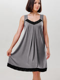 Nightgown features lace detailing along the neckline and hem